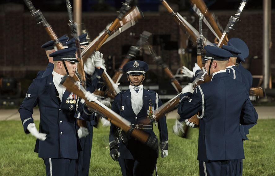 The U.S. Air Force Honor Guard Drill Team performs a rifle demonstration during the 2016 Air Force Tattoo at Joint Base Anacostia-Bolling, Washington, D.C., Sept. 22, 2016. In addition to the team's performance, the event consisted of U.S. Air Force Band routines, aircraft flyovers and heritage speeches. (U.S. Air Force photo/Senior Airman Jordyn Fetter)