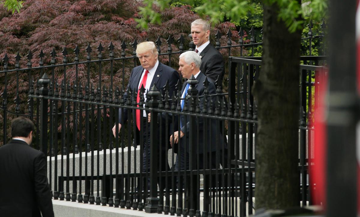 President Donald Trump and Vice President Mike Pence leave a briefing for members of the U.S. Senate on North Korea at the White House in Washington on April 26, 2017. (REUTERS/Kevin Lamarque)