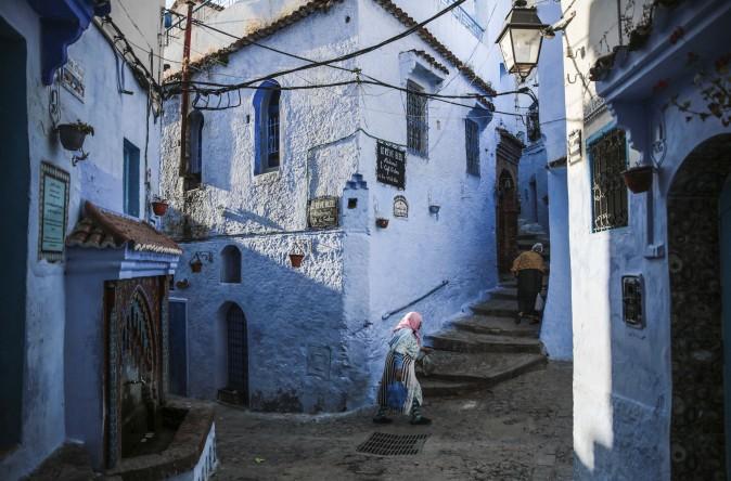 Women walk in an alleyway in the Medina of Chefchaouen, a picturesque town well-known for its blue painted houses and alleyways in northern Morocco on April 27, 2017. (AP Photo/Mosa'ab Elshamy)