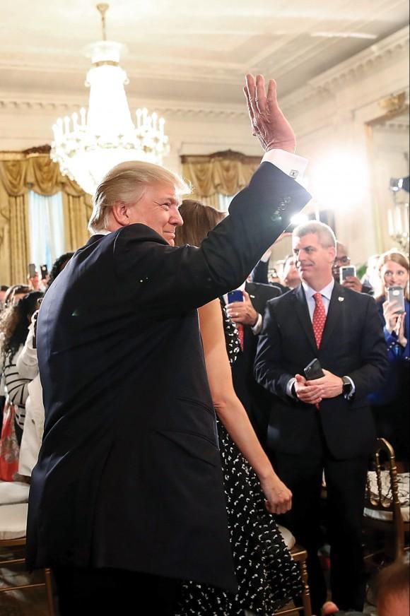 President Donald Trump arrives for an event recognizing the Wounded Warrior Project's Soldier Ride in the East Room of the White House on April 6.(Win McNamee/Getty Images)