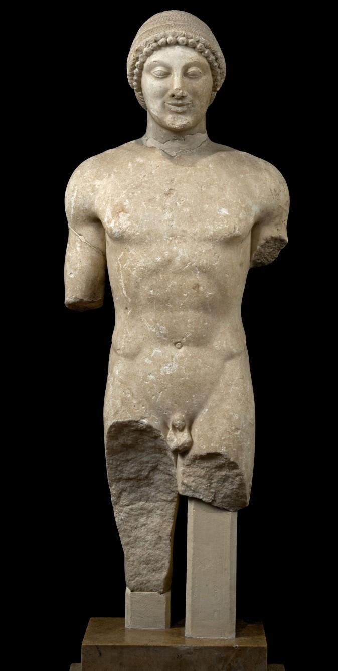 Statue of a kouros. Marble, circa 500 B.C., from the Sanctuary of Apollo at Ptoos. National Archaeological Museum, Athens; Hellenic Ministry of Culture and Sports–Archaeological Receipts Fund. (Kostas Xenikakis)