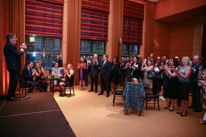 Guests and real estate agents celebrate the opening of Berkshire Hathaway HomeServices New York Properties hosted at the Four Seasons hotel in Manhattan on April 26, 2017. (Benjamin Chasteen/The Epoch Times)