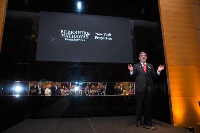 Peter Turtzo, Senior Vice President at Berkshire Hathaway HomeServices speaks to guests during the celebration of their grand opening location in New York. (Benjamin Chasteen/The Epoch Times)