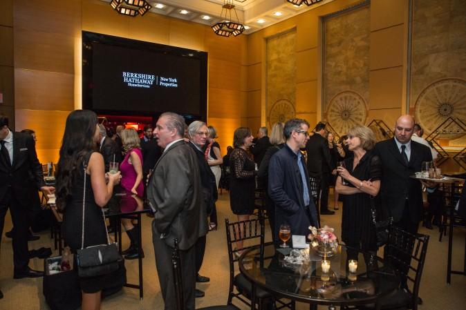 Guests and real estate agents celebrate the opening of Berkshire Hathaway HomeServices New York Properties hosted at the Four Seasons Hotel New York on April 26, 2017. (Benjamin Chasteen/The Epoch Times)