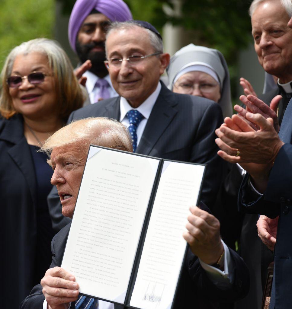 President Donald Trump holds up a proclamation after signing it in the Rose Garden of the White House in Washington on May 4, 2017.<br/>(MANDEL NGAN/AFP/Getty Images)