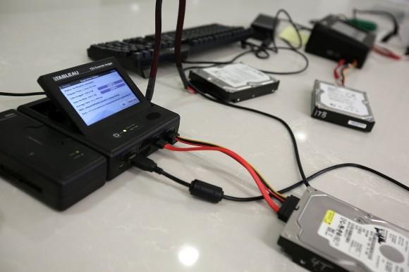 A hard drive duplication system at the ICE cyber crimes center in Fairfax, Virginia. The center supports Homeland Security Investigations cases. (Alex Wong/Getty Images)