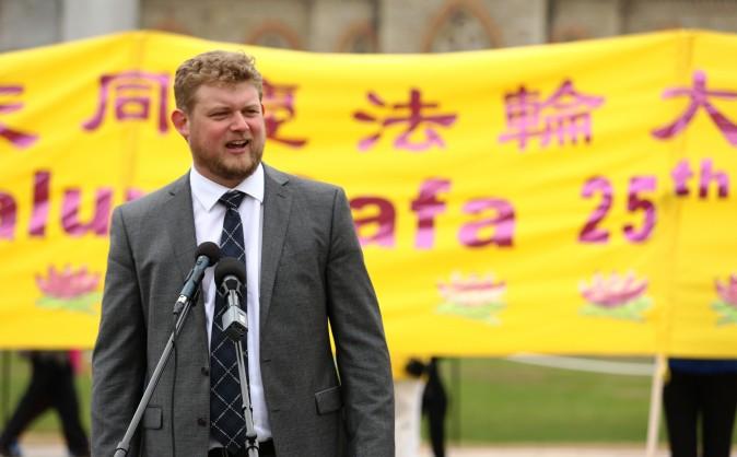 NDP MP Daniel Blaikie speaks at a celebration on Parliament Hill marking the 25th anniversary of Falun Gong, May 9, 2017. (Evan Ning/Epoch Times)
