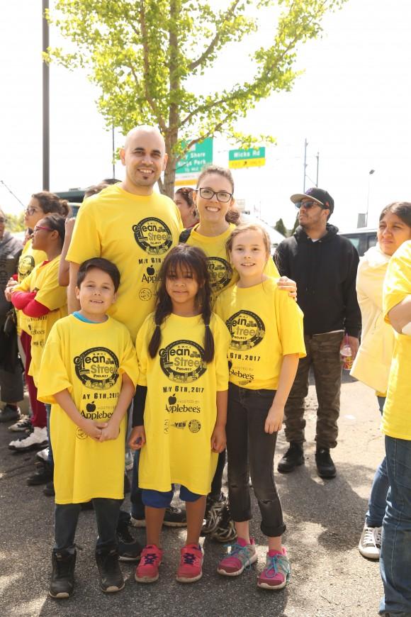Ephrain (back L) and Beria Gaxiola with their two children and a friend. Beria brought 13 people to the cleanup event. (Laura Cooksey for The Epoch Times)
