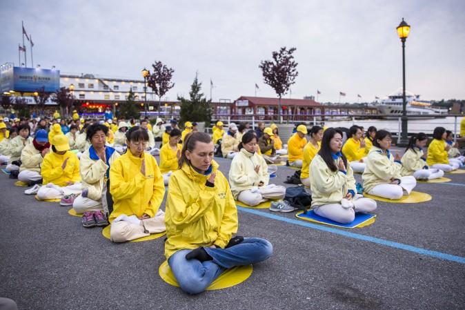 Hundreds of Falun Gong practitioners hold a vigil near the Chinese Consulate in New York on May 12, 2017. (Samira Bouaou/The Epoch Times)