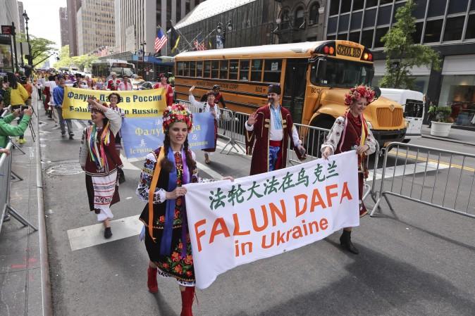 Falun Gong Practitioners from Ukraine march in the World Falun Dafa Day parade in New York on May 12, 2017. (Yu Kong/The Epoch Times)