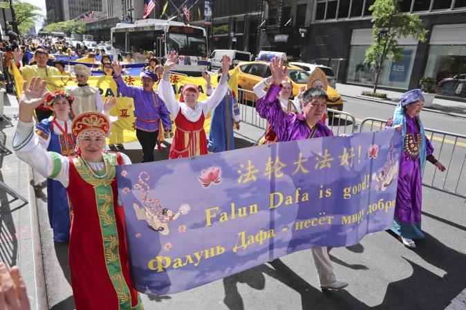 Falun Gong Practitioners from Russia march in the World Falun Dafa Day parade in New York on May 12, 2017. (Edward Dye/The Epoch Times)