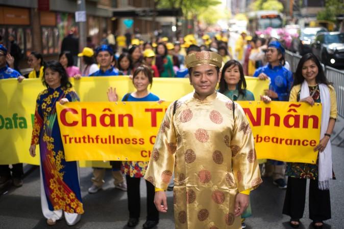 Falun Gong Practitioners from Vietnam march in the World Falun Dafa Day parade in New York on May 12, 2017. (Mihut Savu/The Epoch Times)