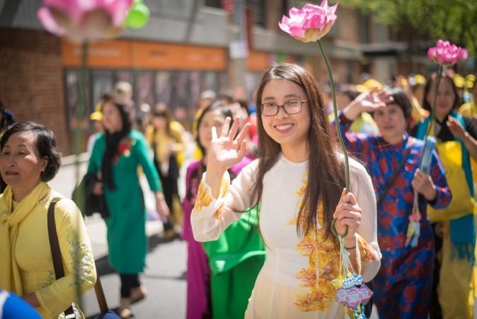 Thousands of Falun Gong practitioners march in a parade along 42nd Street in New York for World Falun Dafa Day on May 12, 2017. (Mihut Savu/The Epoch Times)