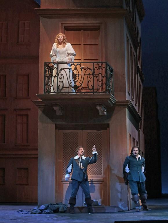 The famous balcony scene in which Roxane (Jennifer Rowley) loses her heart to the poetic Christian (Atalla Ayan). Although, in truth, it is the poetry of Cyrano (Roberto Alagna ) she hears. (Ken Howard/Metropolitan Opera)