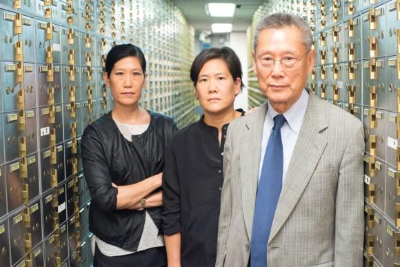 Thomas Sung and two of his daughters as they appear in the documentary, "Abacus: Small Enough to Jail." (Sean Lyness)