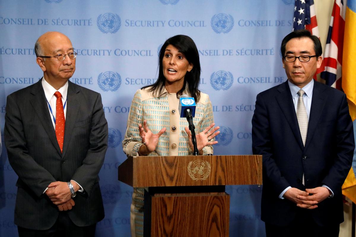 U.S. Ambassador to the United Nations Nikki Haley speaks while Japan's U.N. Ambassador Koro Bessho (L) looks on during a press encounter ahead of an emergency meeting of the U.N. Security Council at the United Nations in New York on May 16, 2017. (REUTERS/Brendan McDermid)