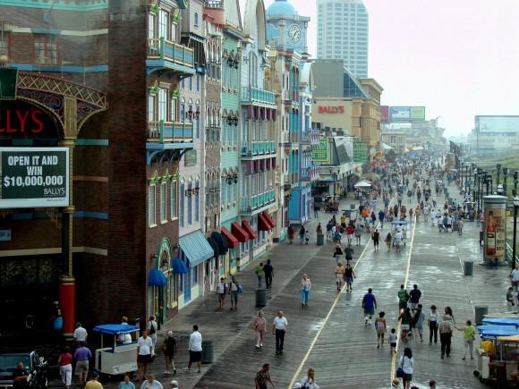 People stroll along Atlantic City's famous boardwalk. The wood is laid in a herringbone pattern. (Italo2712/English Wikipedia)