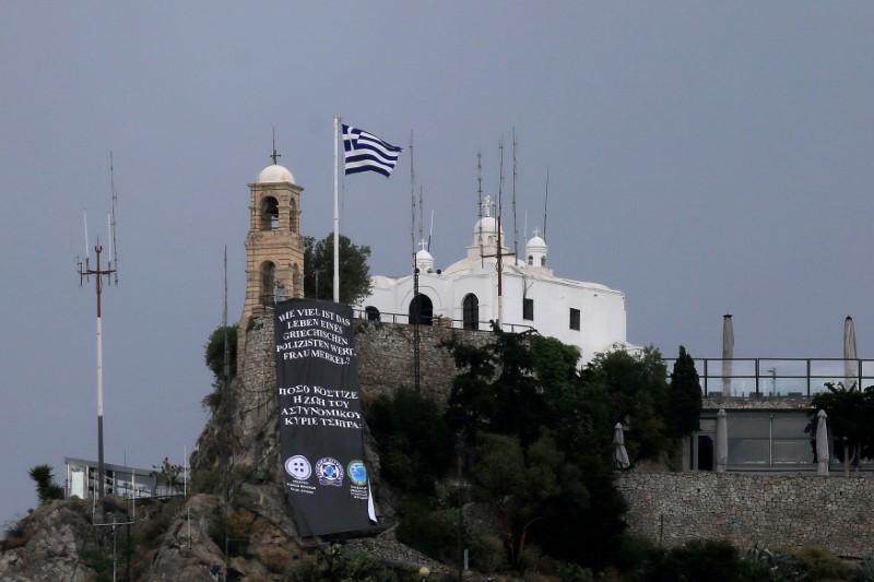 A banner of the union of Greek police officers hangs on Lycabettus hill in Athens, Greece on May 17, 2017. (REUTERS/Alkis Konstantinidis)