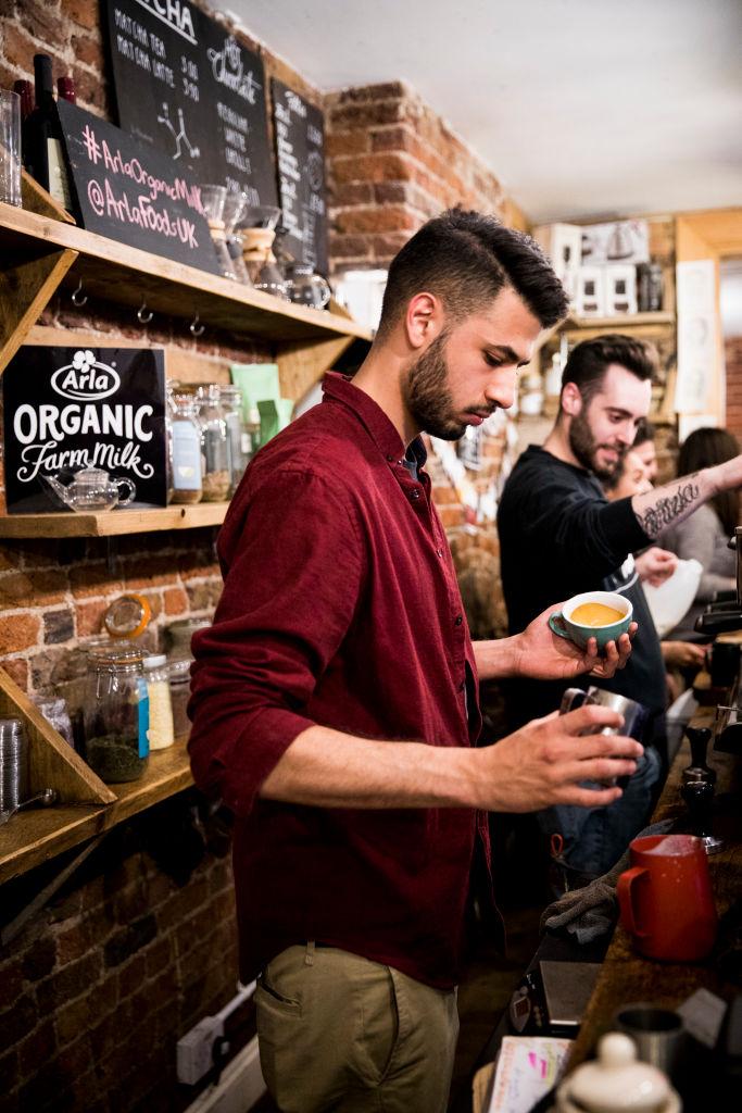 Baristas compete in the Arla Organic Farm Milk Latte Art Throwdown at The Gentlemen Baristas in London on April 12, 2017. (Getty Image)