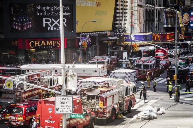 The scene surrounding the area where a vehicle struck pedestrians and crashed in Times Square, New York, on May 18, 2017. (Samira Bouaou/The Epoch Times)