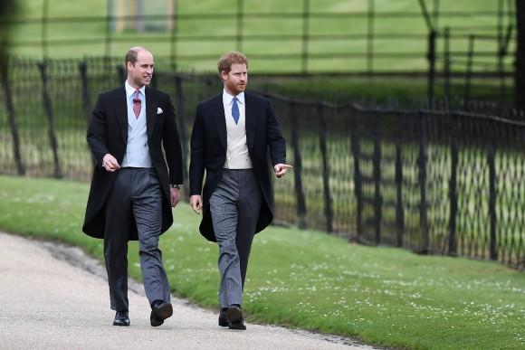 Britain's Prince Harry (R) and Britain's Prince William, Duke of Cambridge walk to the church for the wedding of Pippa Middleton and James Matthews at St Mark's Church in Englefield, west of London, on May 20, 2017. (Justin Tallis/AFP/Getty Images)