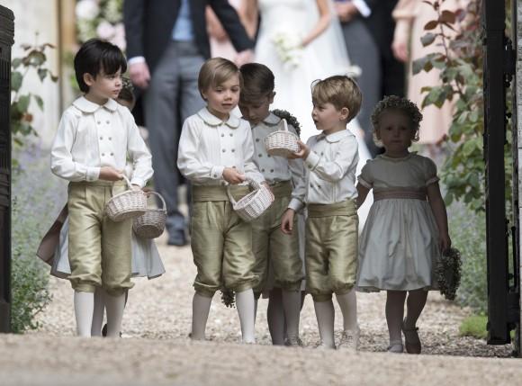 Prince George, fourth left, stands with other flower boys and girls after the wedding of Pippa Middleton and James Matthews at St Mark's Church on May 20, 2017 in Englefield, England. (Arthur Edwards - WPA Pool/Getty Images)