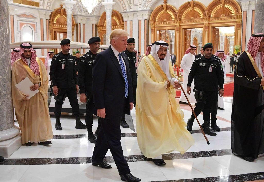 President Donald Trump (C-L) and Saudi Arabia's King Salman bin Abdulaziz al-Saud (C-R) arrive for the Arabic Islamic American Summit at the King Abdulaziz Conference Center in Riyadh on May 21, 2017. (MANDEL NGAN/AFP/Getty Images)