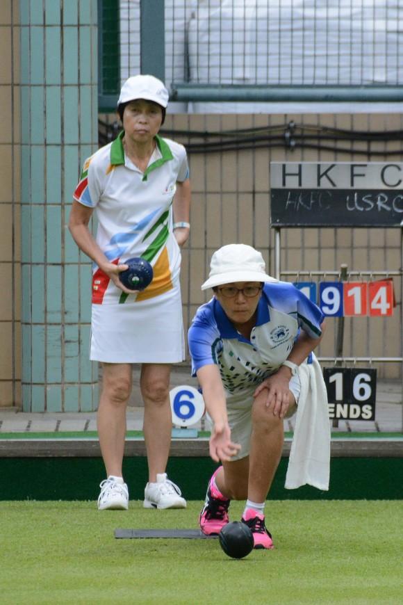 Wanis Sze (delivering) from Hong Kong Football Club on her way to defeating Cindy Robinson of United Service Recreation Club in their league meeting on Saturday, May 20. The 8-0 victory allowed HKFC to move within two points of league leaders Island Lawn Bowls Club. (Stephanie Worth)