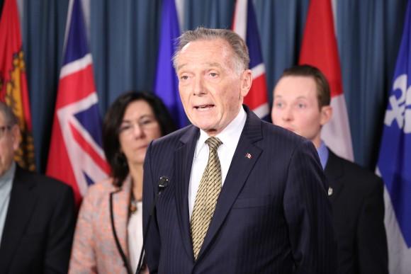 <br/>MP Peter Kent speaks at a press conference in support of efforts to secure the release of Canadian citizen Qian Sun detained in China for her practice of Falun Gong, on Parliament Hill in Ottawa on May 9, 2017. (Jonathan Ren/NTD Television)