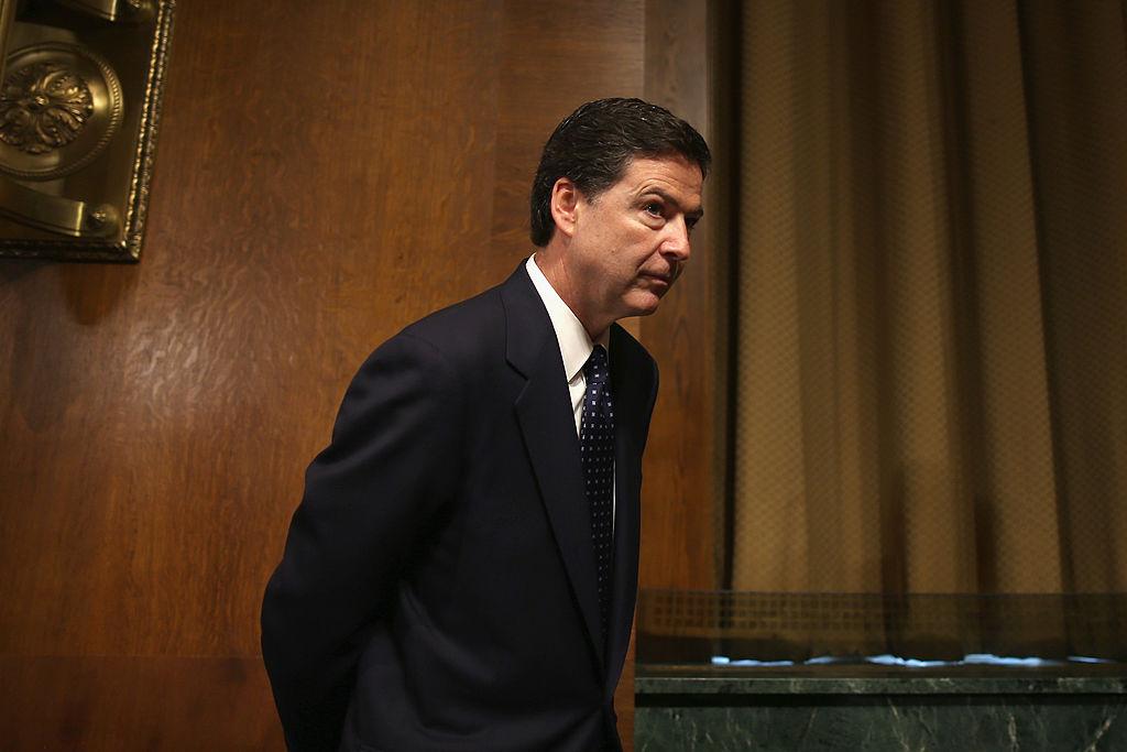 James Comey Jr. (R), nominee to be director of the Federal Bureau of Investigation (FBI) arrives for his Senate Judiciary Committee confirmation hearing on Capitol Hill in Washington July 9, 2013. (Mark Wilson/Getty Images)