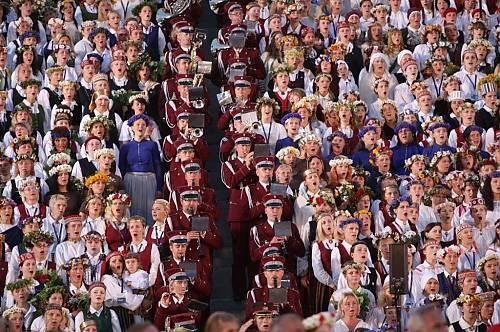 Every five years up to 40,000 costumed singers and dancers gather in Latvia to sing both ancient folk songs and contemporary compositions. (State Agency of Intangible Cultural Republic of Latvia)