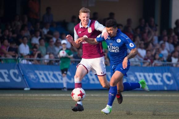 Aston Villa's #5 Jordan Cox, goes head-to-head (or at least hand to head) with Leicester City's #9 Joshua Gordon. (Dan Marchant)