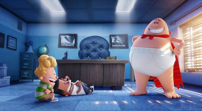 (L–R) Harold (voiced by Thomas Middleditch) and George (voiced by Kevin Hart) crack up at the sight Captain Underpants (voiced by Ed Helms) in DreamWorks Animation's "Captain Underpants: The First Epic Movie." (DreamWorks Animation LLC)