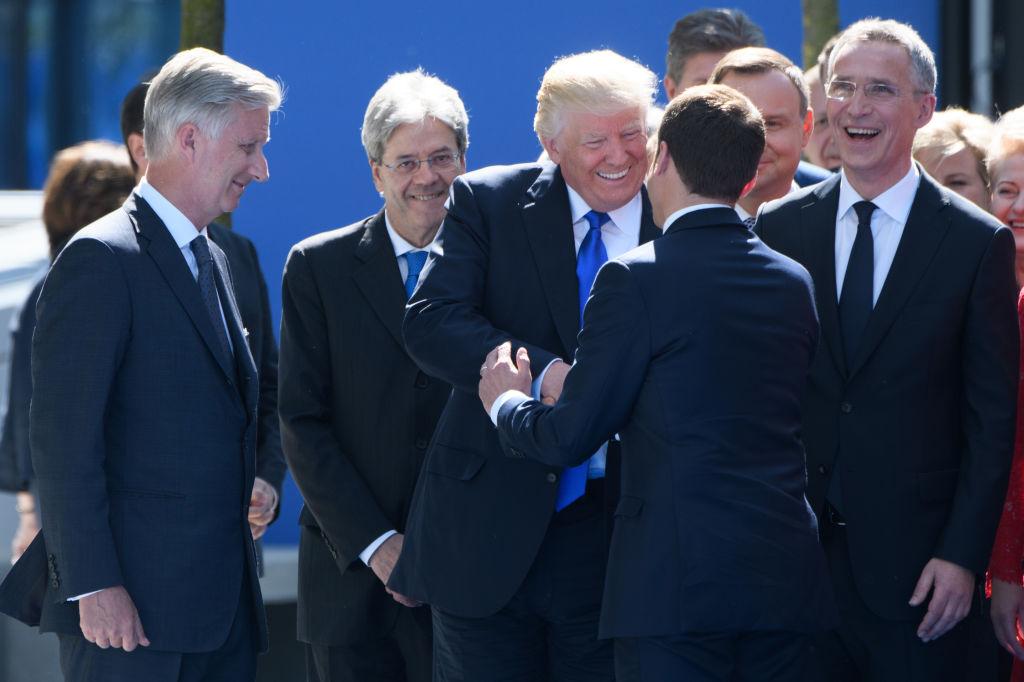 (L-R) Belgium's King Philip, Italian Prime Minister Paolo Gentiloni, President Donald Trump, French President Emmanuel Macron and NATO Secretary General Jens Stoltenberg attend the unveiling ceremony of the new NATO headquarters in Brussels, on May 25, 2017. (CHRISTOPHE LICOPPE/AFP/Getty Images)