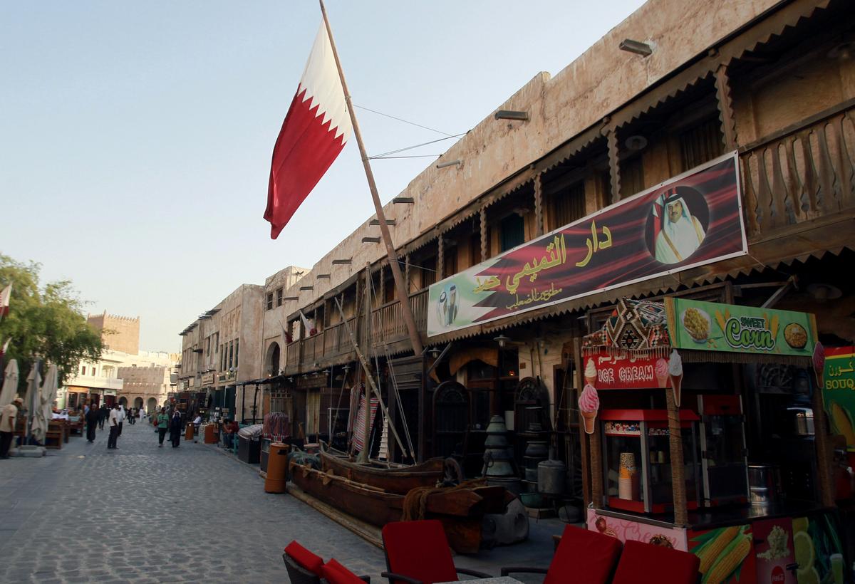 A shop with a picture of Qatar's Emir Sheikh Tamim Bin Hamad Al-Thani is seen in Doha, Qatar onJune 6, 2017. (REUTERS/Naseem Zeitoon)