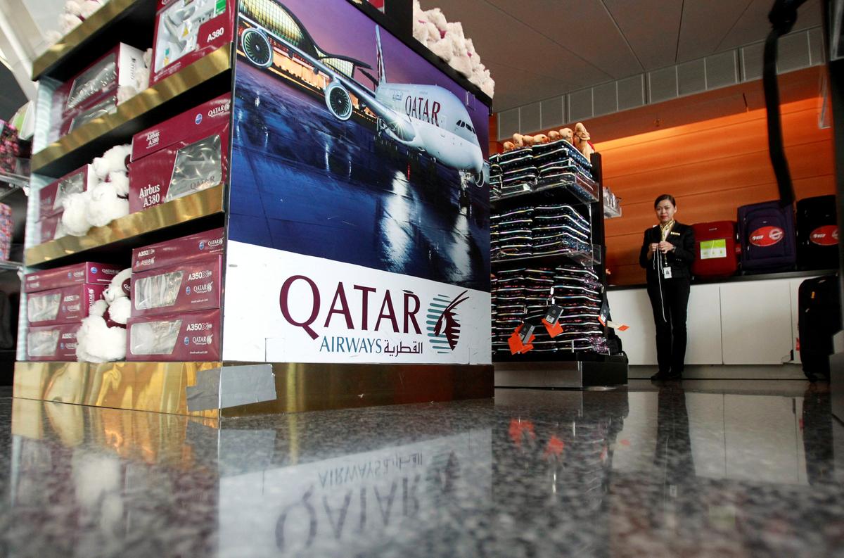 A sign of Qatar Airways is seen at Hamad International Airport in Doha, Qatar on June 7, 2017. (REUTERS/Naseem Zeitoon)