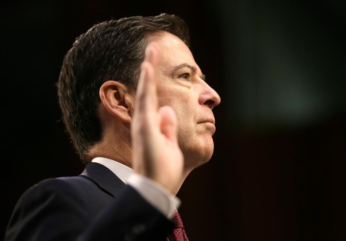 Former FBI Director James Comey is sworn in before testifying before a Senate Intelligence Committee hearing on Russia's alleged interference in the 2016 presidential election on Capitol Hill in Washington on June 8, 2017. (REUTERS/Jim Bourg)