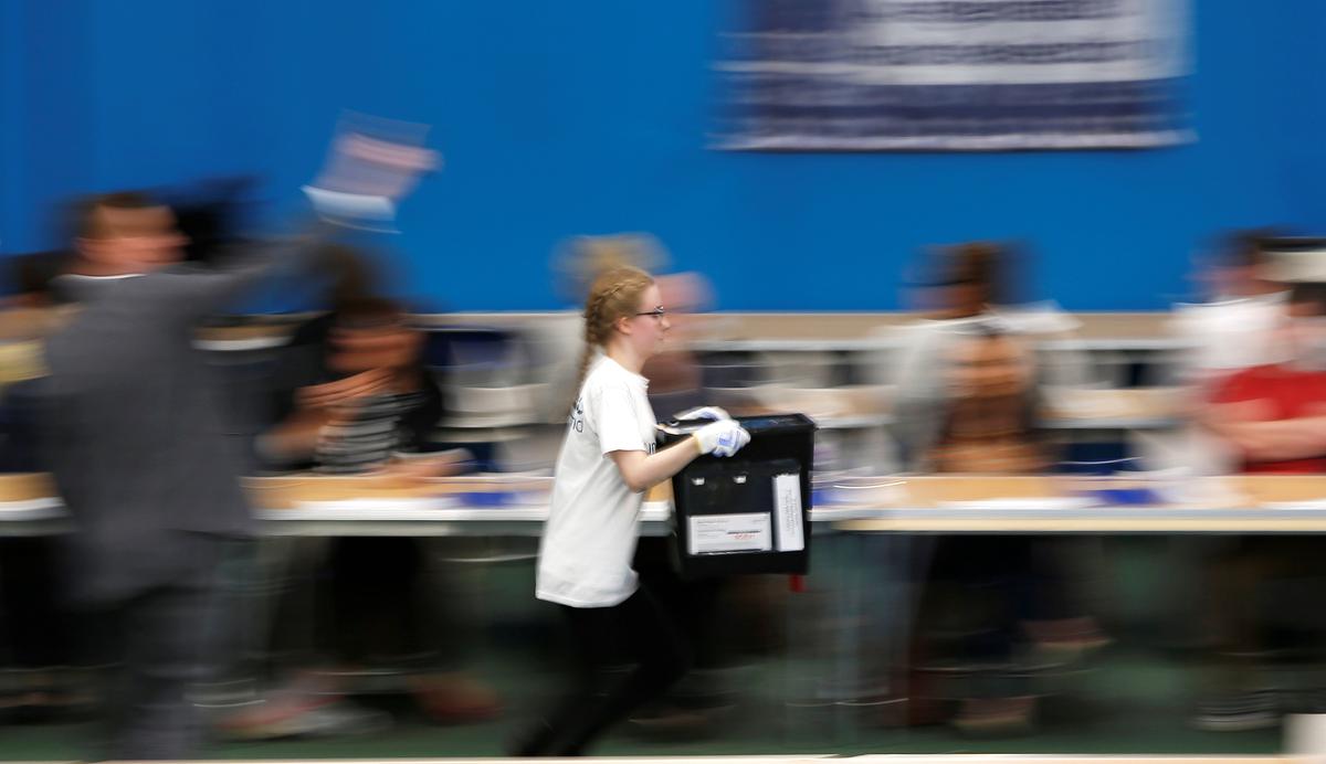 A ballot box is rushed into the counting centre for Britain's general election in Sunderland on June 8, 2017. (REUTERS/Ed Sykes)