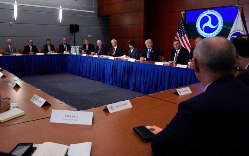 President Donald Trump participates in a roundtable discussion at the Department of Transportation in Washington on June 9, 2017. (Reuters)