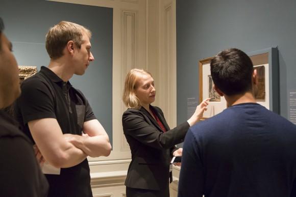 Joanna Sheers Seidenstein, a curatorial fellow at The Frick, gives a talk about the exhibition she organized, "Divine Encounter: Rembrandt's Abraham and the Angels," during the First Fridays event at The Frick Collection on June 2, 2017. (Samira Bouaou/The Epoch Times)