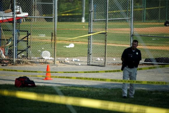 A police officer mans a shooting scene after a gunman opened fire on Republican members of Congress during a baseball practice near Washington in Alexandria, Virginia, on June 14, 2017. (REUTERS/Joshua Roberts)