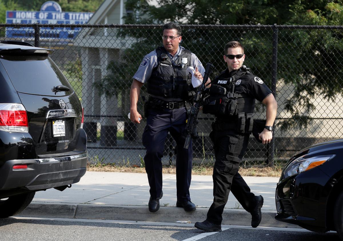 Police investigate a shooting scene after a gunman opened fire on Republican members of Congress during a baseball practice near Washington in Alexandria, Virginia. (REUTERS/Joshua Roberts)