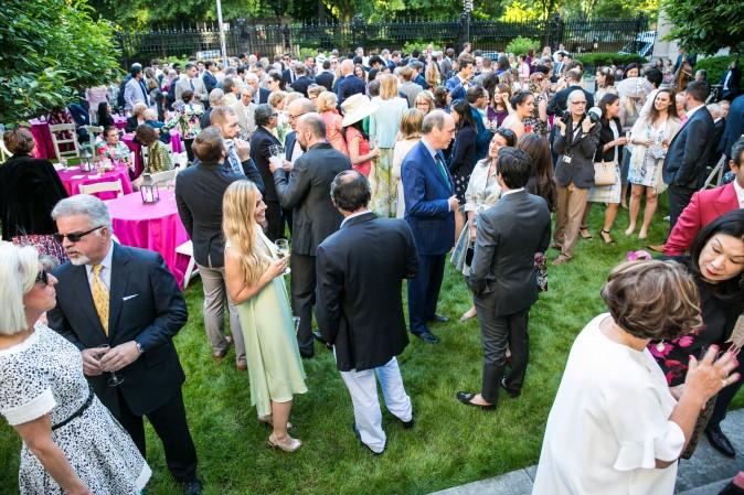 Guests mingle in the Frick's Fifth Avenue Garden. (Benjamin Chasteen/The Epoch Times)