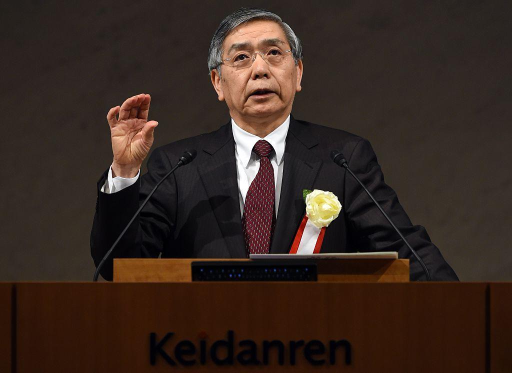 The Bank of Japan governor Haruhiko Kuroda delivers a speech during the Japan Business Federation (Keidanren) Board of Councillors meeting at its headquarters in Tokyo on Dec. 25, 2014. (TOSHIFUMI KITAMURA/AFP/Getty Images)