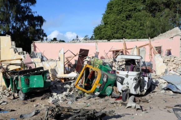 Damaged vehicles are seen at the scene of an attack outside a hotel and an adjacent restaurant in Mogadishu, Somalia June 15, 2017. (Reuters/Stringer)