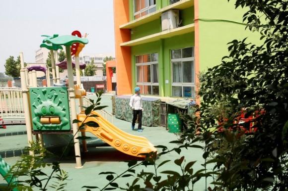 An investigator walks at the scene of an explosion inside a kindergarten in Fengxian County of Xuzhou in Jiangsu Province, China June 16, 2017. (Reuters/Aly Song)