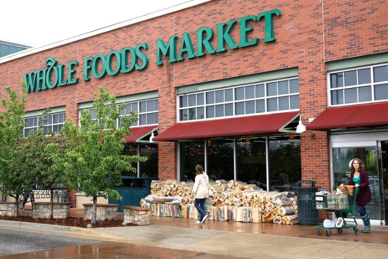 Customers leave the Whole Foods Market in Boulder, Colorado on May 10, 2017. (REUTERS/Rick Wilking)
