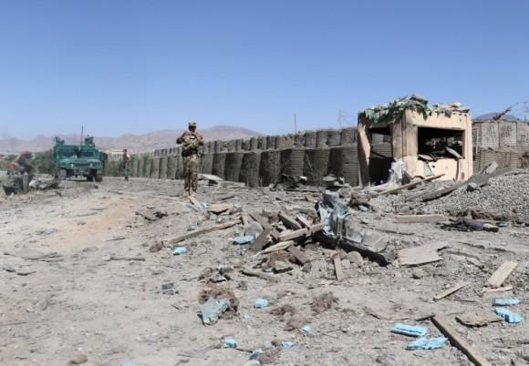 Afghan security forces inspect the aftermath of a suicide bomb blast in Gardez, Paktia Province, Afghanistan June 18, 2017. (Reuters/Samiullah Peiwand)