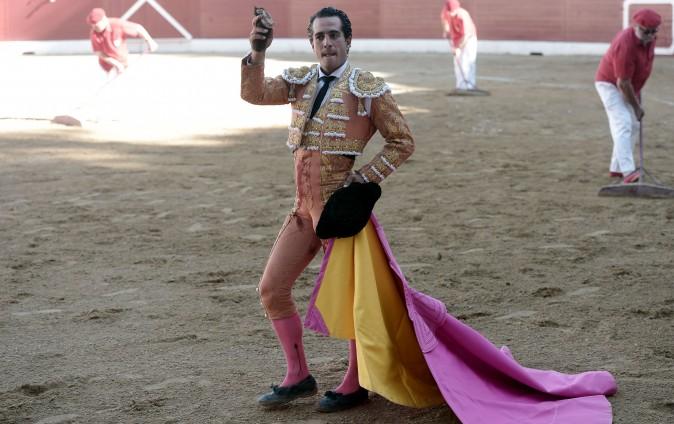 Spanish matador Ivan Fandino holds the ear of a Baltasar Iban bull during a bullfight at Aire sur Adour arena southwestern France, on June 17, 2017. (IROZ GAIZKA/AFP/Getty Images)