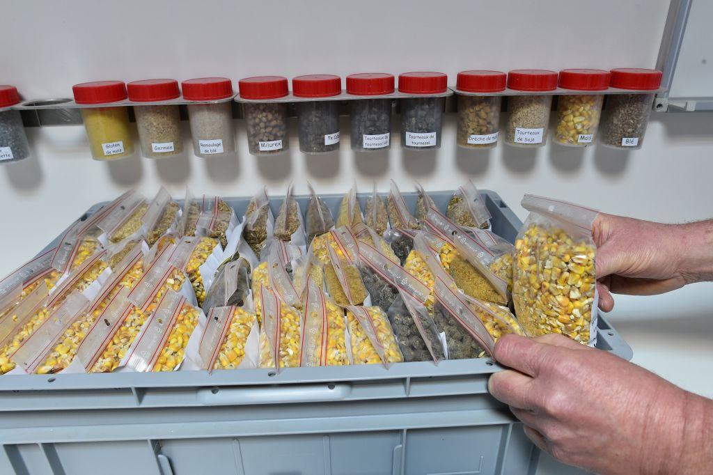 A researcher with samples of corn and soybeans at a laboratory in Loué, France, on Feb. 3, 2017. (JEAN-FRANCOIS MONIER/AFP/Getty Images)